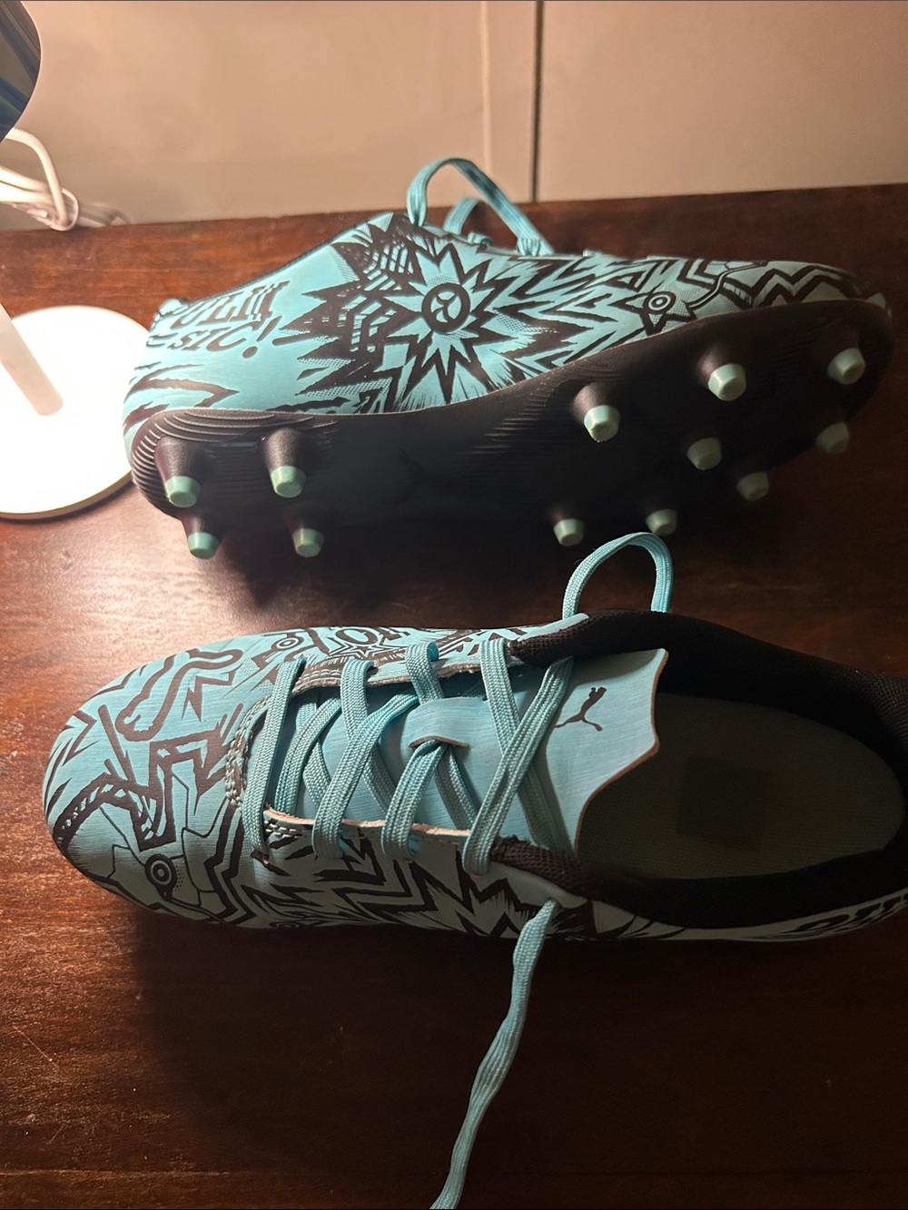 Puma Women's Teal and Black Graphic Soccer Cleats